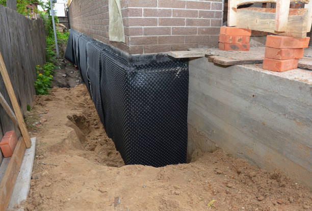 SJ Waterproofing Pros technician performing targeted Foundation Crack Repair assessment in Magnolia, OH